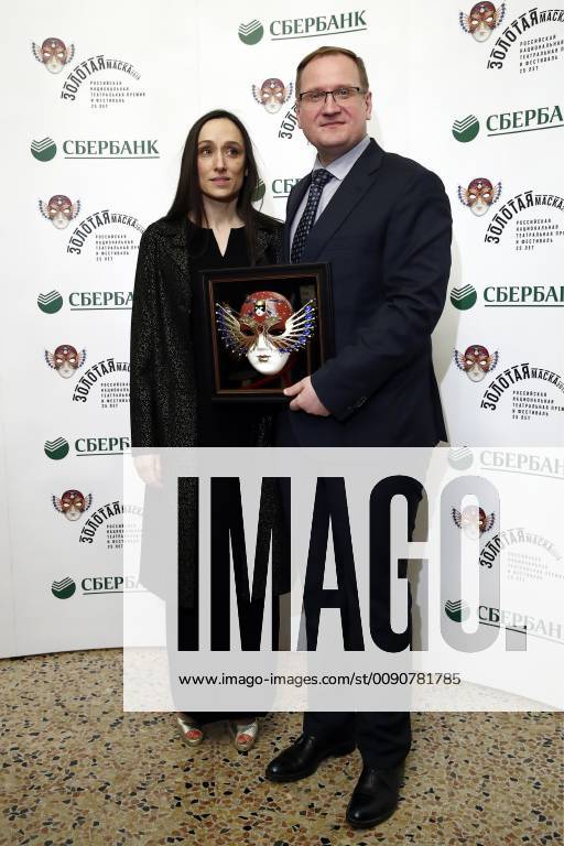 Actress Audrey Bonnet (L) and Andrei Borisov, executive director of the Perm Opera and Ballet Theatre, receive the Opera Best Production award for the Jeanne au Bucher production by the Perm Opera and Ballet Theatre at the 2019 Golden Mask award ceremony at the Historic Stage of the Bolshoi Theatre. Artyom Geodakyan TASS TS0A86DE