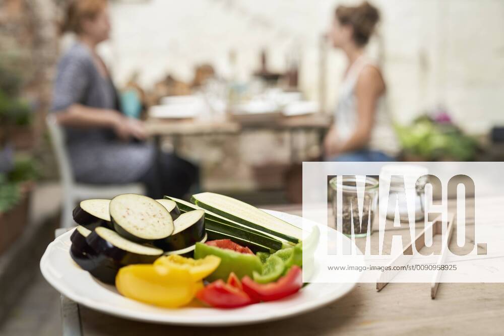 Plate with vegetables, ready for barbecue in a backyard model released Symbolfoto property released PDF01794