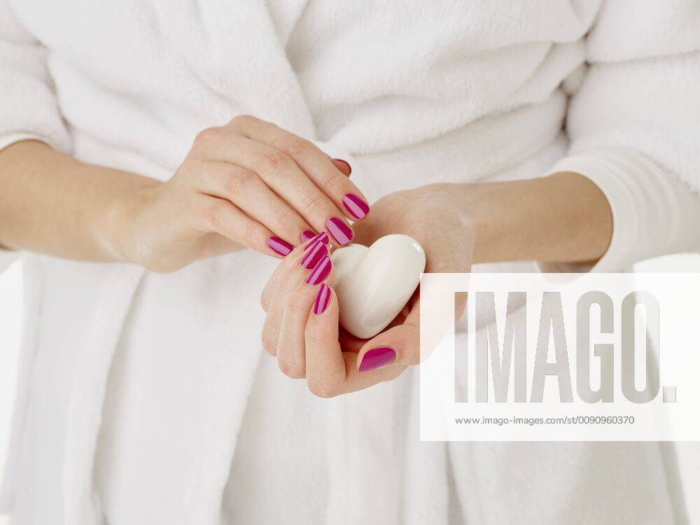 Young woman, hands with varnished nails and soap model released Symbolfoto property released RORF01758