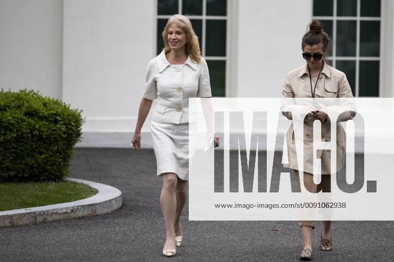Washington, District of Columbia, U.S. - Kellyanne Conway, counselor to United States President Donald Trump, walks out of the West wing of the White House with an aid prior to speaking with members of the media in the West wing driveway at the White House in Washington, D.C. on May 1, 2019. Credit: CNP Washington U.S. - ZUMAs152 20190501_zaa_s152_008