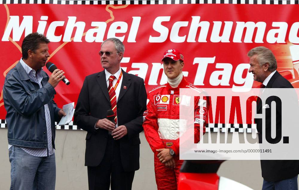 V.li.: RTL-Kommentator Heiko Wasser, Walter Kafitz (Hauptgeschäftsführer der Nürburgring GmbH), Michael Schumacher (Ferrari) und sein Manager Willi Weber (alle Deutschland) beim Michael-Schumacher-Fan-Tag Motorsport Herren Michael-Schumacher-Fan-Tag 2003, Day, Fantag, Fanday, Formel, F1, F, Vdig Gruppe Nürburgring Nürburg