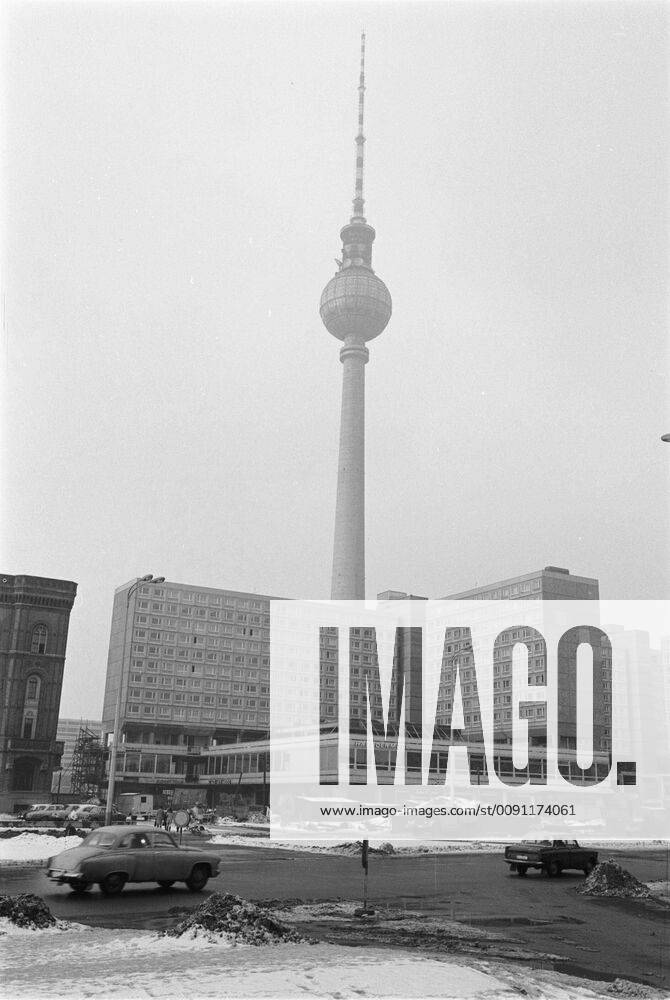 Germany Berlin ca 1969 television tower on Alexanderplatz far left the red town hall in the foreground new buildings with shopping arcade East Berlin Berlin Berlin Germany