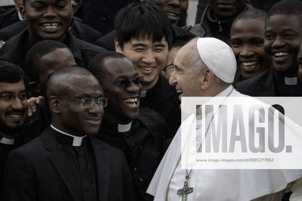 KW20 Vatican: Pope Francis Weekly General Audience Pope Francis reacts as he poses for a photo during the weekly General Audience in St. Peter s Square. The General Audience is held every Wednesday, when the Pope is in Vatican, in Saint Peter s Square which can accommodate around 80,000 people. During the General Audience, also called Papal Audience, the Holy Father addresses the crowd in different languages. Vatican City Vatican Vatican Saint Peter s Square GiuseppexCiccia