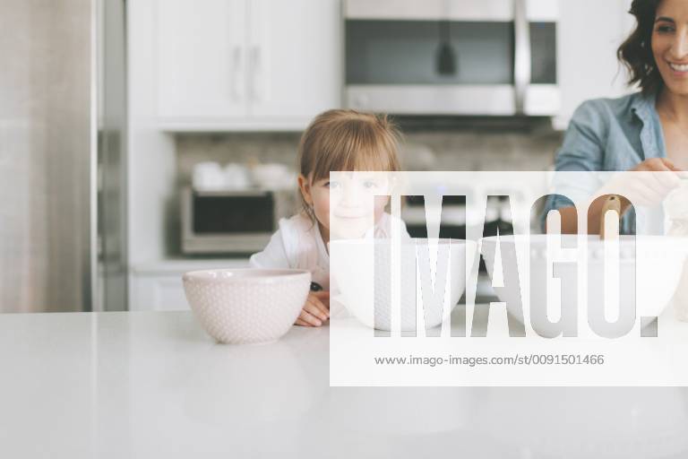 Mother and daughter making a cake together model released Symbolfoto property released CMSF00035