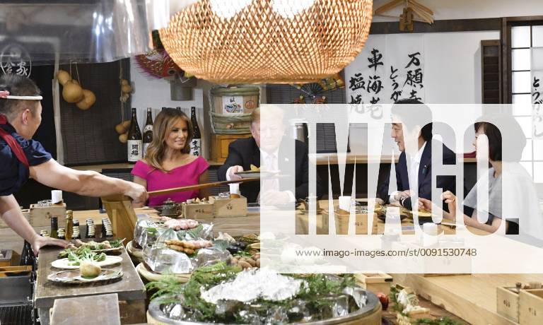 Trump in Japan Japanese Prime Minister Shinzo Abe (2nd from R) and U.S. President Donald Trump (3rd from R) dine at a Japanese charcoal grill restaurant in Tokyo on May 26, 2019. Accompanied by their respective wives -- Akie (R) and Melania (4th from R) -- the Japanese and U.S. leaders had dinner at Inakaya in the glitzy Roppongi district on the eve of their summit talks.