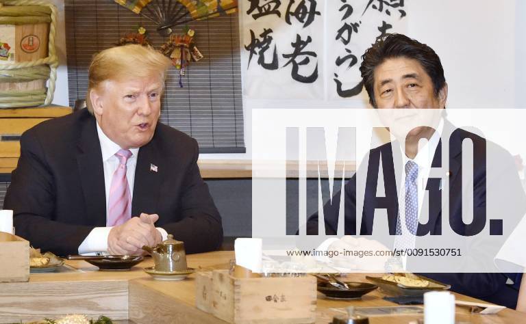 Trump in Japan Japanese Prime Minister Shinzo Abe (R) and U.S. President Donald Trump dine at a Japanese charcoal grill restaurant in Tokyo on May 26, 2019. Accompanied by their respective wives -- Akie and Melania -- the Japanese and U.S. leaders had dinner at Inakaya in the glitzy Roppongi district on the eve of their summit talks.
