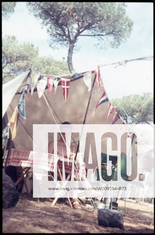 Spain Spain, ca 1956, holidays at the beach, holidays in Spain, man in front of a tent