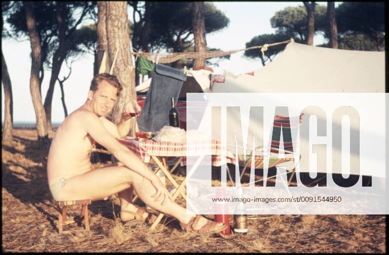 Spain Spain, ca 1956, vacation at the beach, vacation in Spain, man on a campground