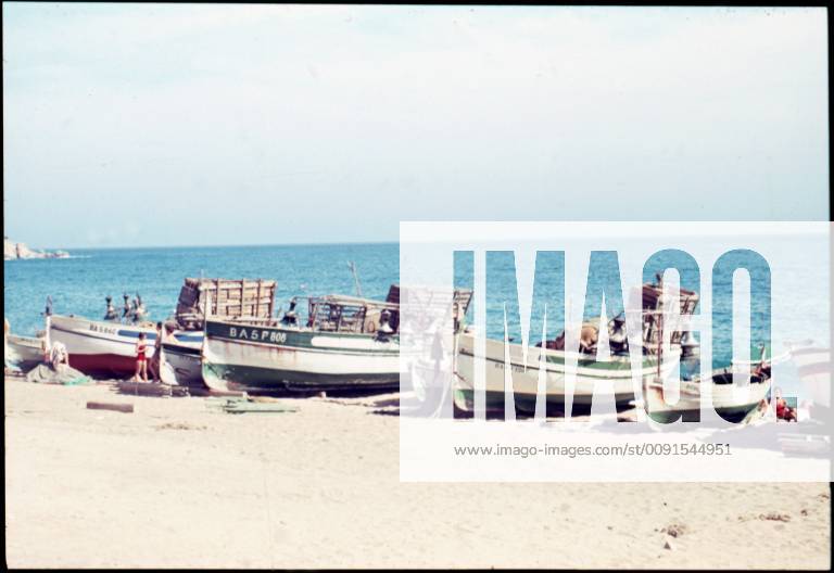 Spain Spain, ca 1956, holidays at the beach, holidays in Spain, bathing between fishing boats