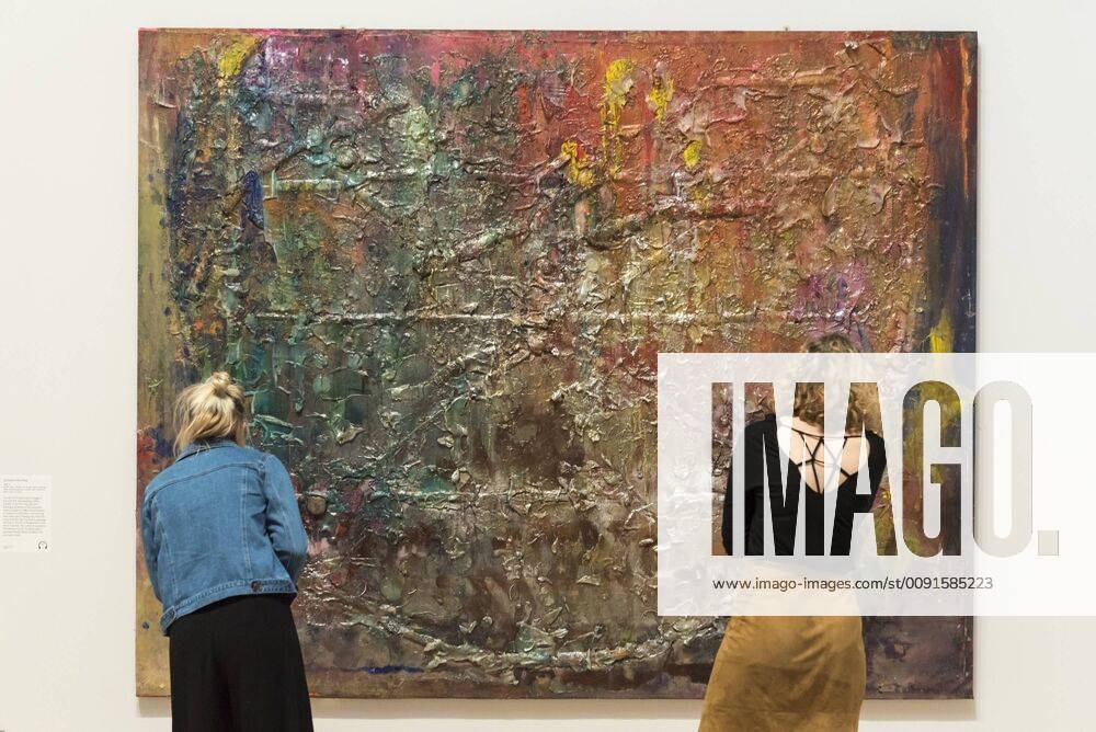 London, UK - LONDON, UK. Staff members view Spreadout Ron Kitaj , 1984-6, by Frank Bowling at a preview of works by artist Frank Bowling (born in Guyana in 1934). The retrospective exhibition spans his six-decade career and takes place 31 May to 26 August 2019 at Tate Britain. London UK - ZUMAl94_ 20190530_zaf_l94_022