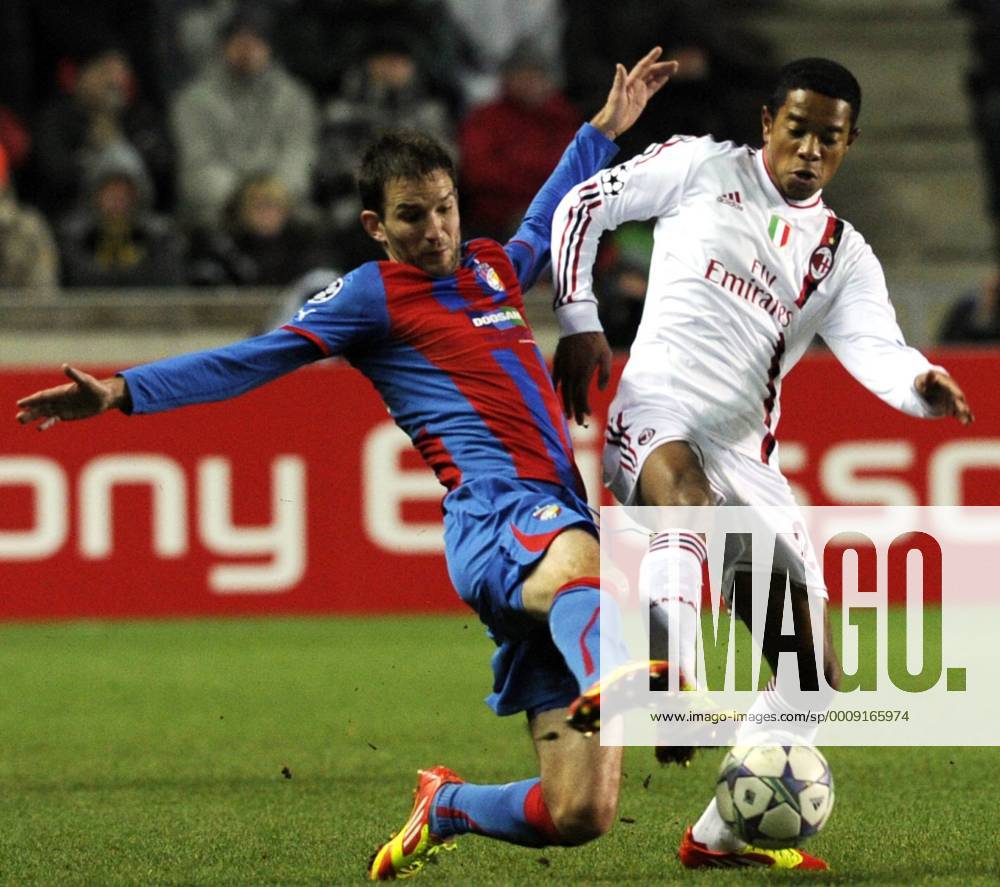 Marek Bakos of Viktoria (left) and Urby Emanuelson during their final Champions League group H soccer match FC Viktoria Plzen vs AC Milan at Synot Tip Arena Eden stadium in Prague, Czech Republic, Tuesday, December 6, 2011. (CTKxPhoto VitxSimanek) CTKPhoto032201112061028101