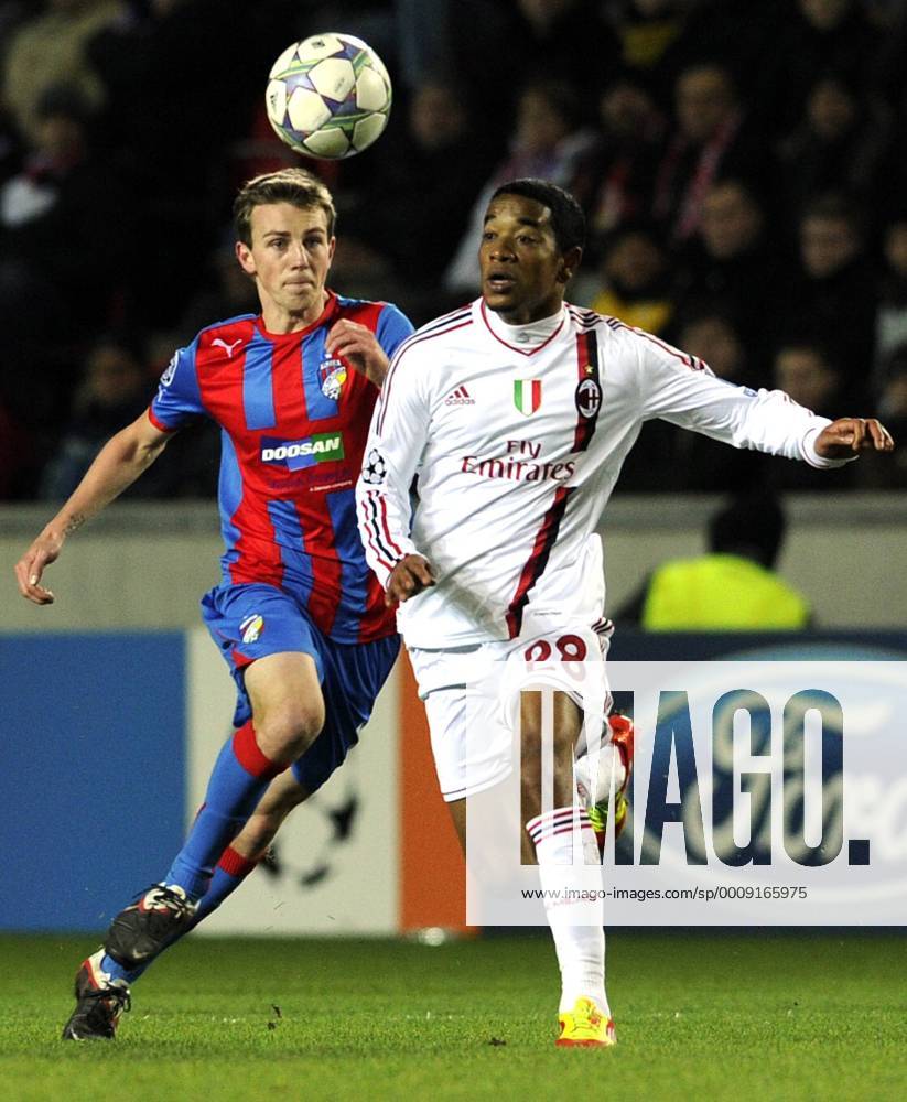 Urby Emanuelson of Milan (right) and Vladimir Darida of Viktoria during their final Champions League group H soccer match FC Viktoria Plzen vs AC Milan at Synot Tip Arena Eden stadium in Prague, Czech Republic, Tuesday, December 6, 2011. (CTKxPhoto VitxSimanek) CTKPhoto036201112061044901