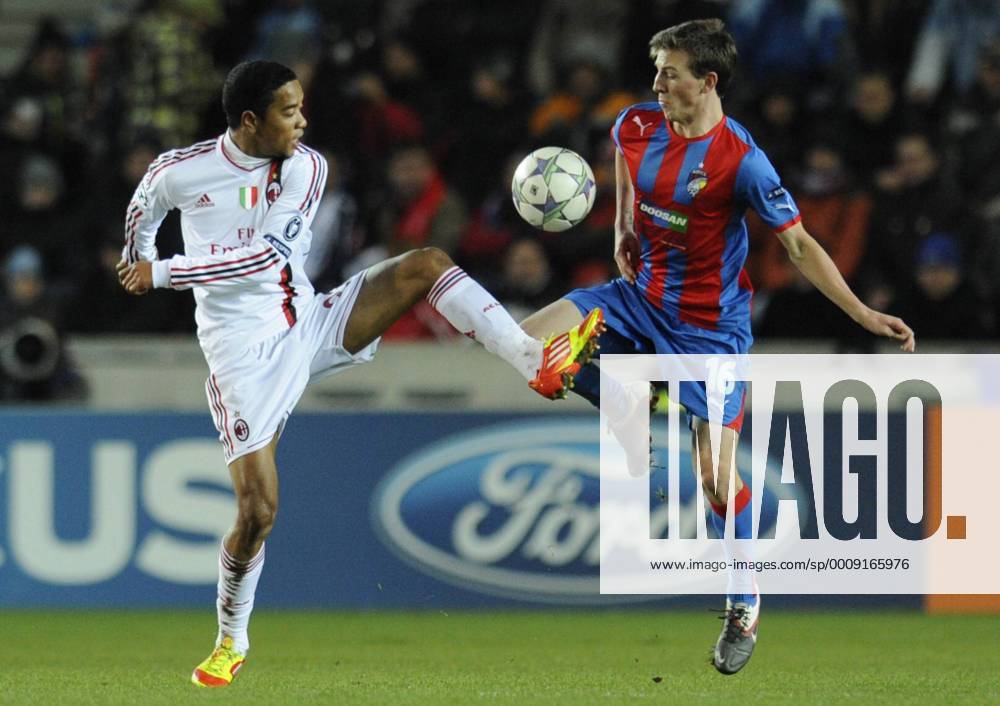 Urby Emanuelson of Milan (left) and Vladimir Darida of Viktoria during their final Champions League group H soccer match FC Viktoria Plzen vs AC Milan at Synot Tip Arena Eden stadium in Prague, Czech Republic, Tuesday, December 6, 2011. (CTKxPhoto MichalxKamaryt) CTKPhoto016201112061050801