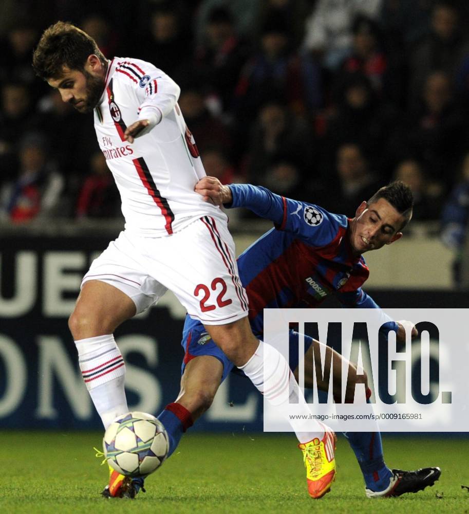 Antonio Nocerino of Milan (left) and Milan Petrzela of Viktoria during their final Champions League group H soccer match FC Viktoria Plzen vs AC Milan at Synot Tip Arena Eden stadium in Prague, Czech Republic, Tuesday, December 6, 2011. (CTKxPhoto VitxSimanek) CTKPhoto030201112061025301