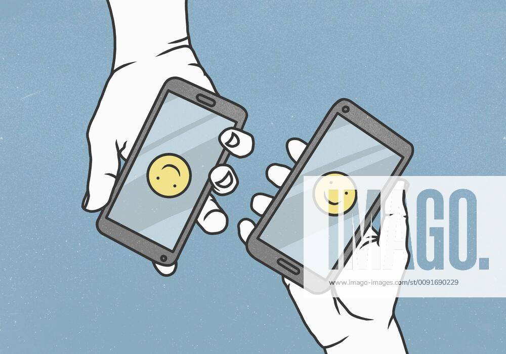 View from above smiley faces on smart phones