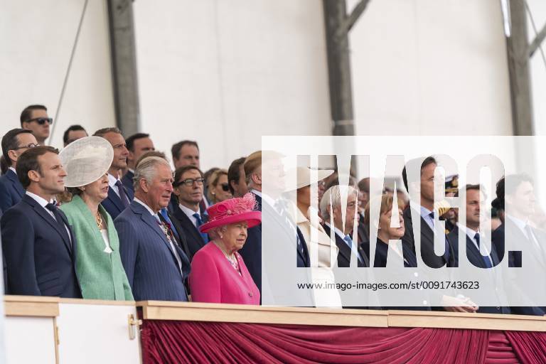 Portsmouth, England, United Kingdom - U.S President Donald Trump stands with European leaders during an event marking the 75th anniversary of D-Day June 5, 2019 in Portsmouth, England. Standing left to right are: French President Emmanuel Macron, British Prime Minister Theresa May, Prince Charles, Queen Elizabeth II, U.S. President Donald Trump, First Lady Melania Trump, Greek President Prokopis Pavlopoulos, German Chancellor Angela Merkel, Dutch Prime Minister Mark Rutte, Luxembourg Prime Minister Xavier Bettel and Canadian Prime Minister Justin Trudeau. Portsmouth United Kingdom - ZUMAp138 20190605_zaa_p138_058