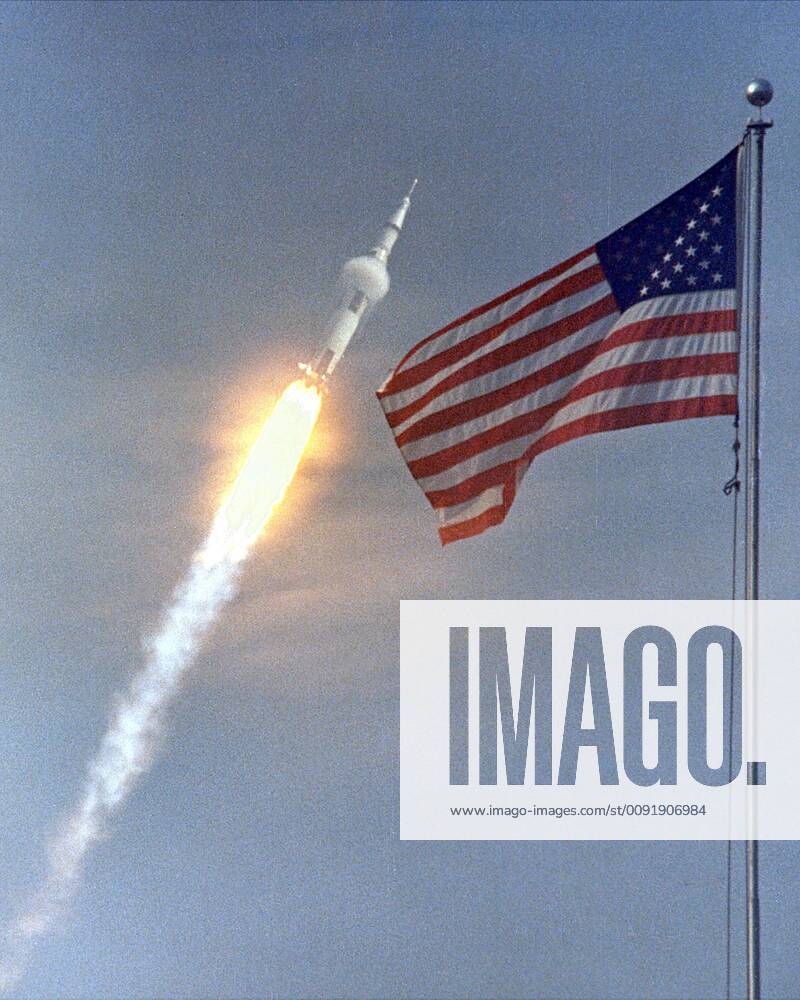 June16, 1969 - Kennedy Space Center, Florida, U.S. - The American flag heralded the launch of Apollo 11, the first Lunar landing mission, on July 16, 1969. The massive Saturn V rocket lifted off from s Kennedy Space Center with astronauts Neil A. Armstrong, Michael Collins, and Edwin Buzz Aldrin at 9:32 a.m. EDT. Four days later, on July 20, Armstrong and Aldrin landed on the Moon s surface Kennedy Space Center U.S. - ZUMAz03_ 19690616_sha_z03_336