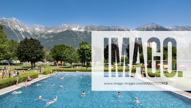 Outdoor swimming pool Tivoli, Innsbruck, Tyrol, Austria Swimming pool Outdoor swimming pool Swimming pool Sunbathing lawn in the background the Nordkette