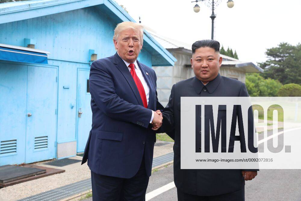(190630) -- PANMUNJOM, June 30, 2019 -- U.S. President Donald Trump meets with Kim Jong Un, top leader of the Democratic People s Republic of Korea (DPRK), in the inter-Korean border village of Panmunjom on June 30, 2019. NEWSIS) DONALD TRUMP-KIM JONG UN-MEETING WangxJingqiang