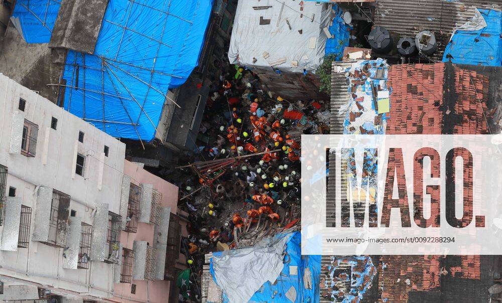 (190716) -- MUMBAI, July 16, 2019 (Xinhua) -- Rescue work is carried out at the site of a building collapse in Mumbai, India, July 16, 2019. Death toll from a four-storey building collapse in Mumbai on Tuesday rose to four, while eight persons have been rescued and hospitalized so far and around 40 to 50 people were still feared trapped. (Str Xinhua) INDIA-MUMBAI-BUILDING COLLAPSE