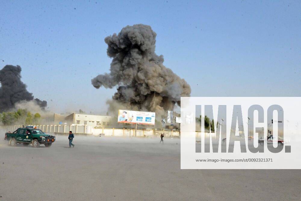 (190718) -- KANDAHAR, July 18, 2019 -- Smoke rises at the site of the attack outside the provincial police headquarters in Kandahar, capital of Afghanistan s southern Kandahar province, July 18, 2019. At least 12 people were killed and over 90 others injured after a Taliban car bombing and ensuing gun fire rocked provincial police headquarters in Kandahar city, capital of Afghanistan s southern Kandahar province, on Thursday, witnesses said. ) AFGHANISTAN-KANDAHAR-POLICE HEADQUARTERS-ATTACK SanaullahxSeiam