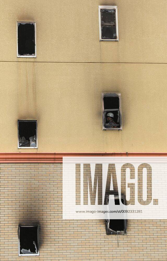 (190719) -- KYOTO, July 19, 2019 -- A fireman works inside a Kyoto Animation studio building after an arson attack in Kyoto, Japan, July 19, 2019. The motive behind an alleged arson attack on a studio of Kyoto Animation Co. in western Japan, which killed 33 people a day earlier, may have been the theft of ideas, sources said Friday. Local media quoting investigative sources, said that a 41-year-old man apprehended over the alleged arson attack told police he started the fire at the three-story studio because the company stole a novel. ) JAPAN-KYOTO-ANIME STUDIO FIRE DuxXiaoyi
