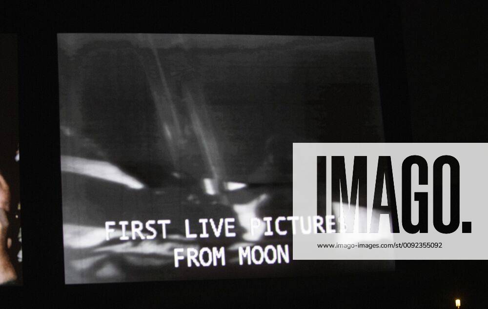 A large screen shows Neil Armstrong descending the Apollo 11 Lunar Module on the surface of Moon after after a four-day trip from Earth, during a display on the Washington Monument on the National Mall in Washington, DC shortly before midnight on July 19, 2019. To commemorate the 50th anniversary of NASA s Moon Landing on July 20, 1969, the Smithsonian recreated the launch, landing and return of Apollo 11 on the National Mall using the Washington Monument and large screens. Neil Armstrong, Buzz Aldrin and Michael Collins were aboard Apollo 11 with Armstrong and Aldrin landing on the moon on July 20, 1969. WAP20190720126A PATxBENIC