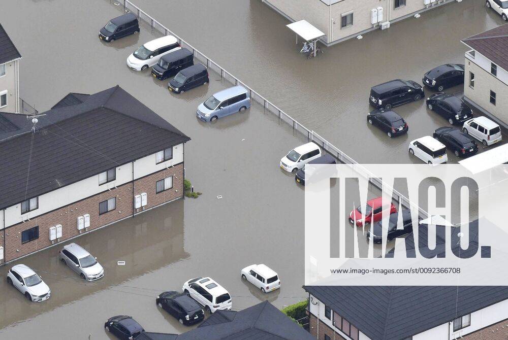 Heavy rain in southwestern Japan Photo taken from a Kyodo News helicopter shows flooded parking lots in Tachiarai in Fukuoka Prefecture, southwestern Japan, after heavy rain on July 21, 2019.