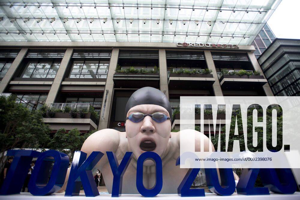 Tokyo, Tokyo, Japan - A sculpture of an athlete is unveiled in Tokyo s Nihombashi district on July 23, 2019, a day before the marking of the one year countdown to the Tokyo Olympics opening ceremony. Tokyo Japan - ZUMAn230 20190723_zaa_n230_048