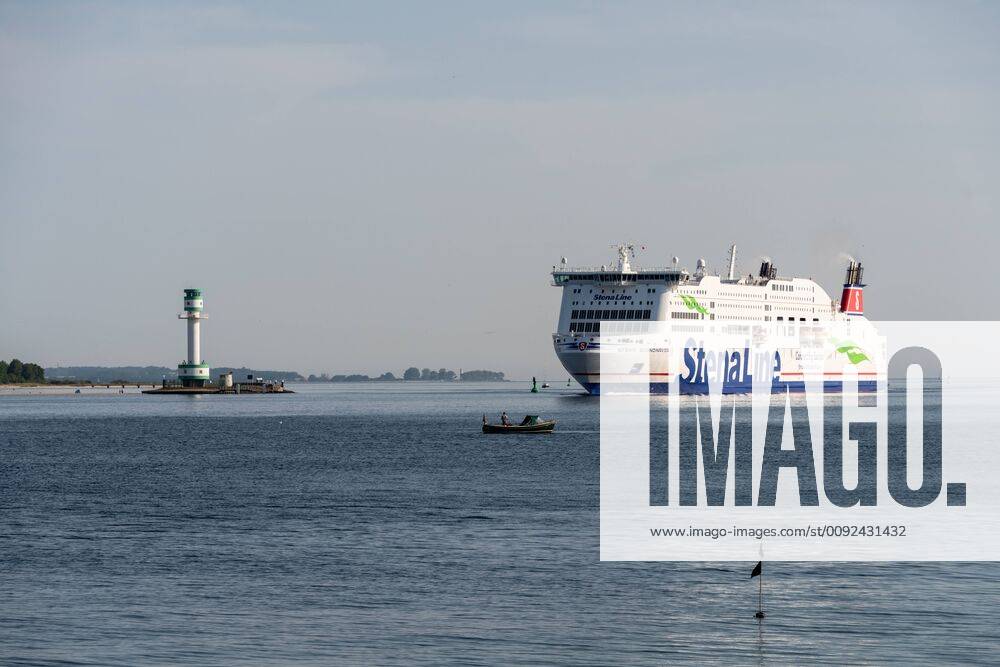 Early in the morning, the Swedish ferry Stena Germanica from Göteborg arrives in the Kiel Fjord heading for its berth at the Stena Terminal in Kiel Heikendorf Möltenort Schleswig Holstein Germany