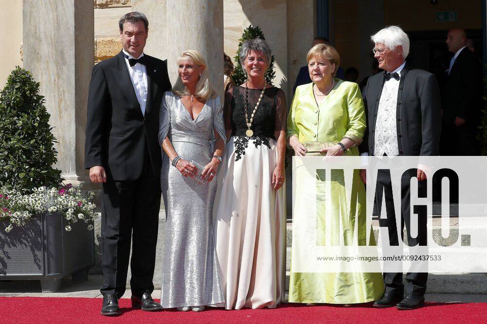 Opening of the 108 Richard Wagner Festspiele in Bayreuth with the production of Richard Wagners opera Tannhäuser Promis goes over the red carpet to the Königsportal of the Festspielhaus in Bayreuth Dr Markus Söder Prime Minister of Bavaria with wife Karin Baumüller Söder , Dr Angela Merkel Chancellor of the Federal Republic of Germany , Brigitte Merk Erbe Lord Mayor of Bayreuth with husban