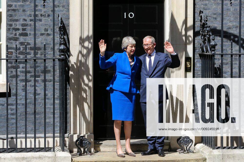 British Prime Minister Theresa May (L) and her husband Philip May (R) wave on the steps of 10 Downing Street after her statement prior..The 76th British Prime Minister will hand her resignation to the Queen and later today, the former London Mayor and Foreign Secretary, Boris Johnson, now the leader of Conservative Party, will become the 77th Prime Minister of Britain. London United Kingdom - ZUMAs197 20190724_zaa_s197_208