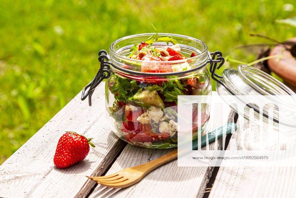 Strawberry avocado salad with feta, rocket and pine nuts in jar SARF04300