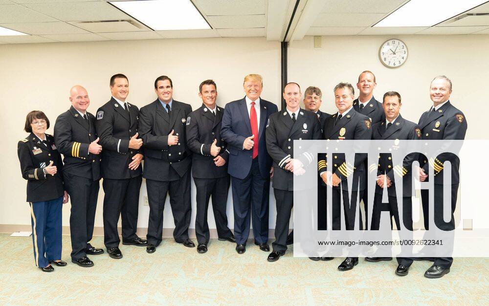 Oregon District Of Dayton, Ohio, United States Of America: President Donald J. Trump and First Lady Melania Trump meet with First Responders during their visit with victims of Sunday s attack and their family members Wednesday, Aug. 7, 2019, at the Miami Valley Hospital in Dayton, Ohio. Nine people were killed and 27 others were injured in a mass shooting on Sunday in the Oregon District of Dayton, Ohio..People: President Donald Trump, First Lady Melania Trump. Oregon District Of Dayton United States Of America - ZUMAs214 20190807_zaa_s214_005