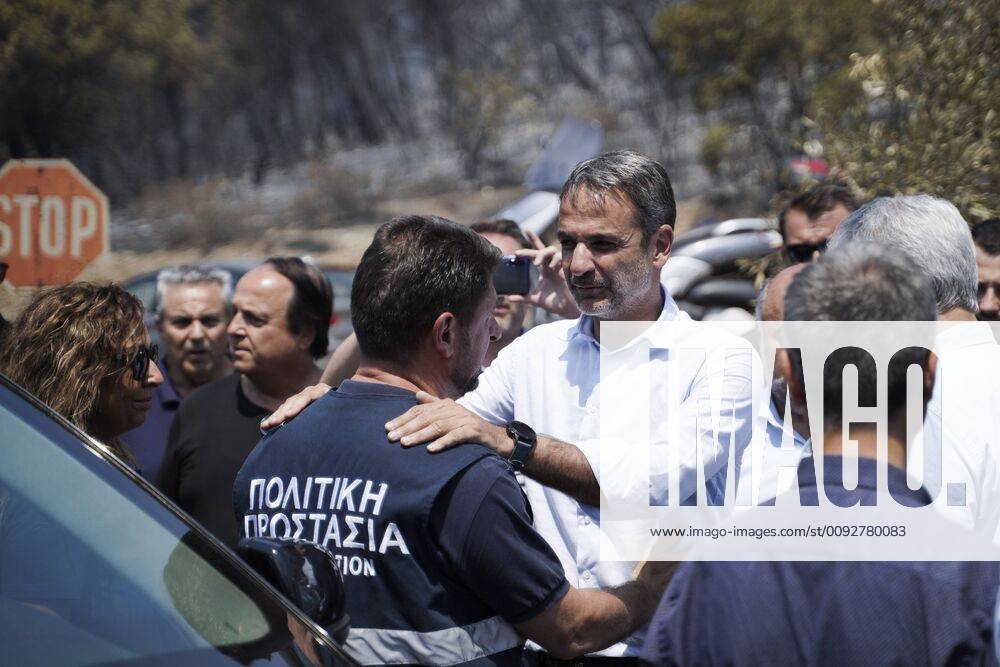 (190815) -- ATHENS, Aug. 15, 2019 (Xinhua) -- Greek Prime Minister Kyriakos Mitsotakis inspects Makrymalli village, on Evia island, Greece, on Aug. 14, 2019. Amid ongoing efforts to extinguish a destructive wildfire, Greek Prime Minister Kyriakos Mitsotakis on Wednesday called for stronger cooperation among European Union (EU) members to tackle future natural disasters. He made the call during a visit to fire-stricken Evia island. Fanned by strong winds, the flames threatened villages some 80 kilometers northeast of Athens, forcing the evacuation of hundreds of residents on Tuesday. (Photo by Nick Paleologos Xinhua) GREECE-EVIA-WILDFIRE