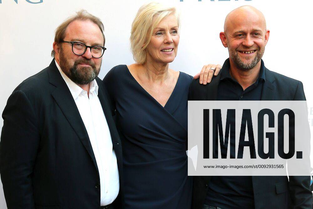 Award GOETZ GEORGE PRIZE 2019 Gustav Peter Woehler, Marika George and Juergen Vogel on the Red Carpet for the award of the GOETZ GEORGE PRIZE on 19 August 2018 in the Astor Film Lounge The endowed prize shall commemorate this lifes work of Goetz George Berlin Charlottenburg Berlin Germany