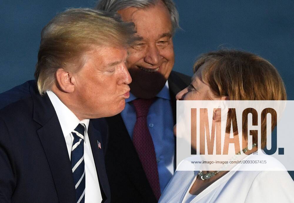 Biarritz, France. Boris Johnson attends the G7- Day Two. President Trump greets Angela Merkel at the G7 Summit in Biarritz, France. xAndrewxParsonsx xi-Imagesx IIM-20048-0238