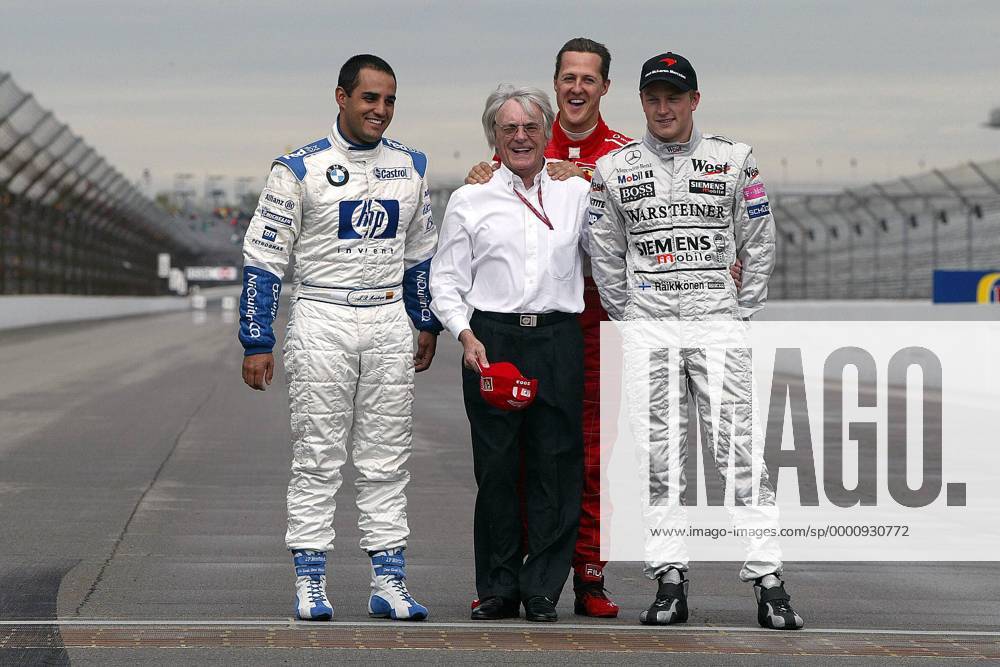 F1-Chef Bernie Ecclestone (England) und die WM-Kandidaten 2003: v.li.: Juan Pablo Montoya (Kolumbien BMW-Williams), Michael Schumacher (Deutschland Ferrari) und Kimi Räikkönen (Finnland McLaren-Mercedes) Motorsport Grand Prix Herren Großer Preis der USA 2003, Formel 1 Weltmeisterschaft, F1, F, GP, WM, Vdig Gruppe Indianapolis Freude, Begeisterung,