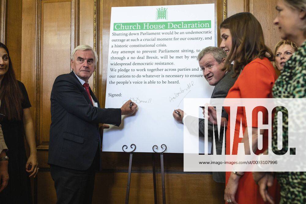 London, UK. Shadow Chancellor John McDonnell and SNP Westminster Leader Ian Blackford Party sign the Church House Declaration to assert their commitment to avoiding a no deal exit from the EU. London UK - ZUMAl94_ 20190827_zaf_l94_020