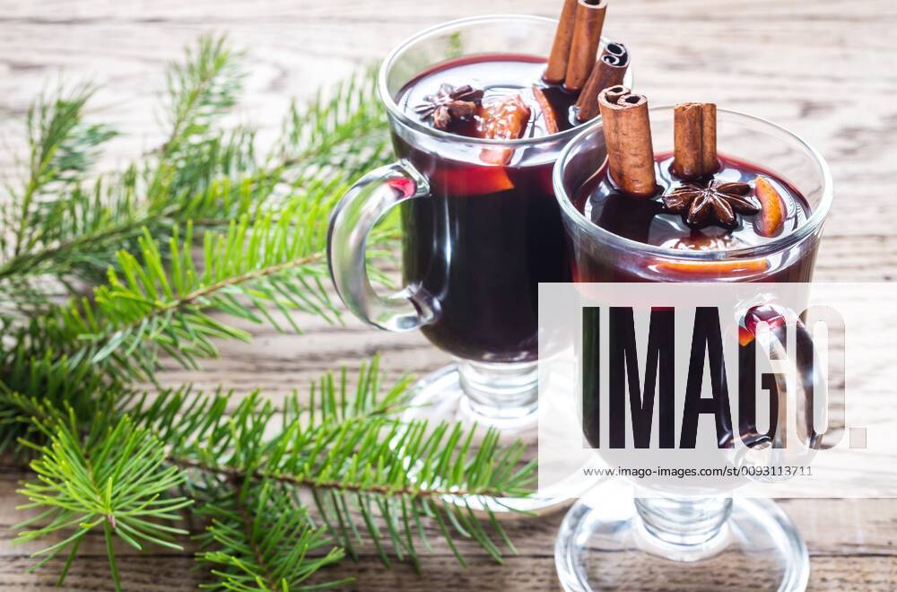 Two glasses of mulled wine with fir branch