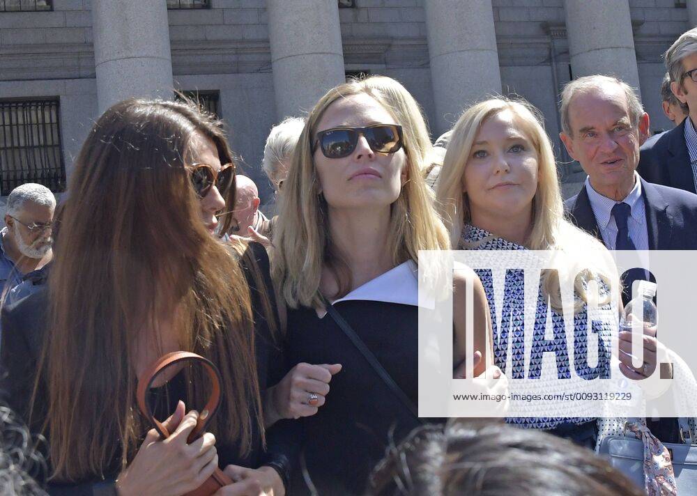 Alleged victims of billionaire Jeffrey Epstein, Annie Farmer, middle, and Virginia Giuffre, right, exit Manhattan Federal Court, Tuesday, August 27th, 2019 in New York City. Epstein committed suicide while confined in the Manhattan Correctional Facility. NYP20190827816 LOUISxLANZANO