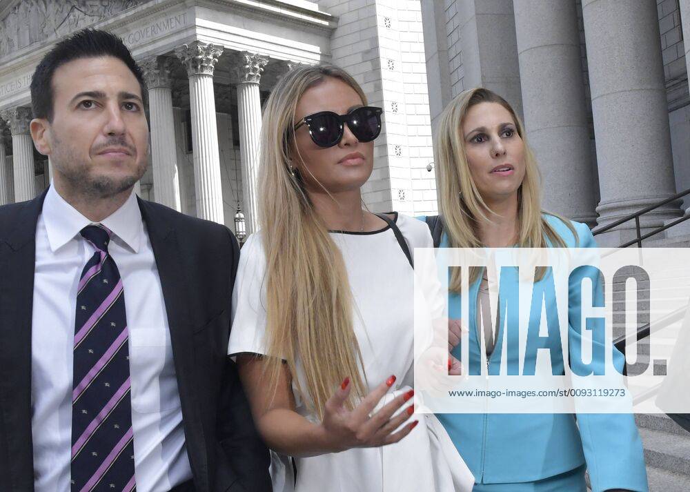 Alleged victim of billionaire Jeffrey Epstein Jennifer Araoz, left, exits Manhattan Federal Court, Tuesday, August 27th, 2019 in New York City. Epstein committed suicide while confined in the Manhattan Correctional Facility. NYP20190827807 LOUISxLANZANO