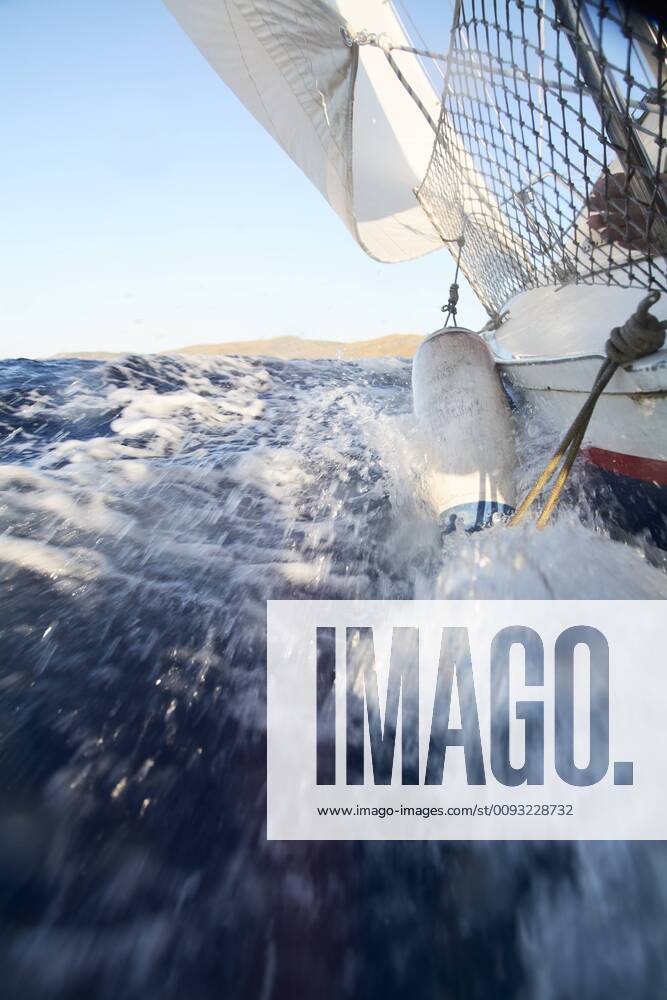 Sailing boat splashing water, Menorca, Spain model released Symbolfoto IGGF01255