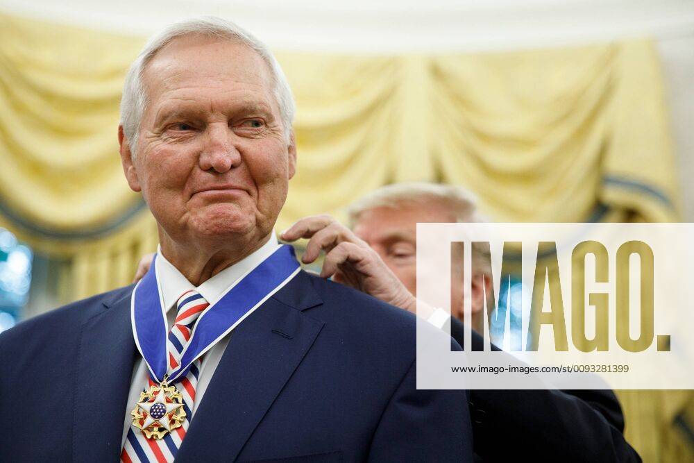United States President Donald J. Trump presents the Presidential Medal of Freedom to NBA Hall of Fame member Jerry West during a ceremony inside of the Oval Office on September 5, 2019, at the White House in Washington. West, 81, graduated from West Virginia University and played fourteen seasons with the Los Angeles Lakers. Credit: Tom Brenner CNP AdMedia 244607 2019-09-05 District of Columbia Washington