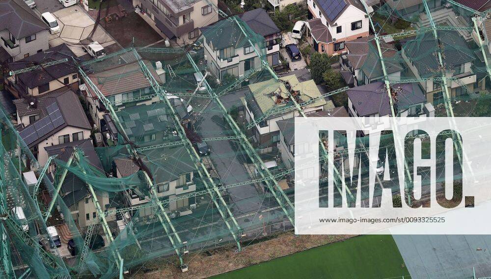 Typhoon Faxai hits Tokyo area Photo taken from a Kyodo News helicopter shows a golf driving range fence collapsed on top of houses in Ichihara, Chiba Prefecture, on Sept. 9, 2019, in the wake of Typhoon Faxai, which landed near Tokyo.