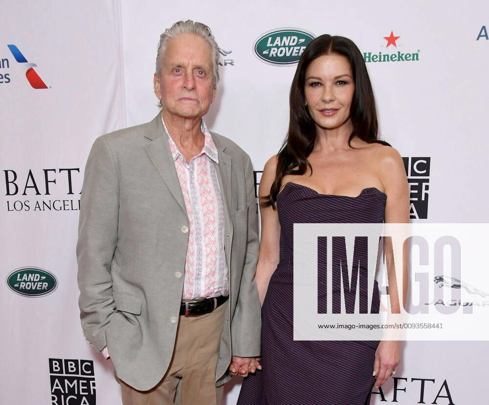 Beverly Hills, California - Michael Douglas, Catherine Zeta-Jones. 2019 BAFTA Los Angeles and BBC America TV Tea Party held at Poolside at The Beverly Hilton Hotel. Photo Credit: Birdie Thompson AdMedia 245283 2019-09-21 California Beverly Hills Etats-Unis