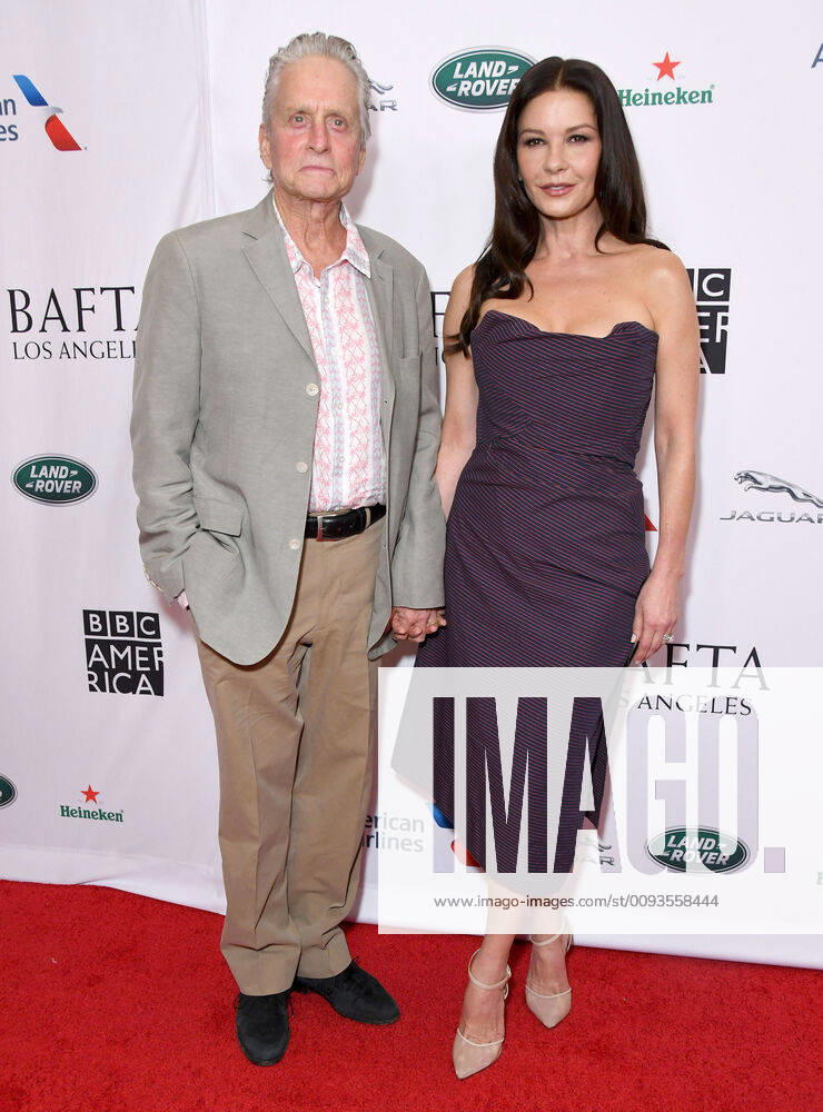 Beverly Hills, California - Michael Douglas, Catherine Zeta-Jones. 2019 BAFTA Los Angeles and BBC America TV Tea Party held at Poolside at The Beverly Hilton Hotel. Photo Credit: Birdie Thompson AdMedia 245283 2019-09-21 California Beverly Hills Etats-Unis