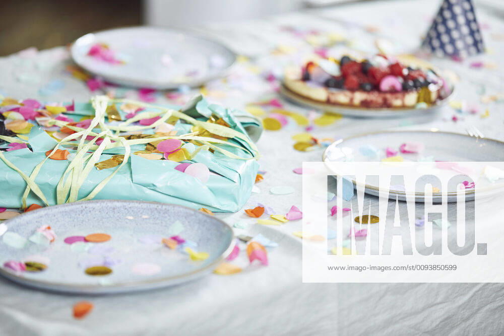 Present on table, decorated with confetti property released MCF00217