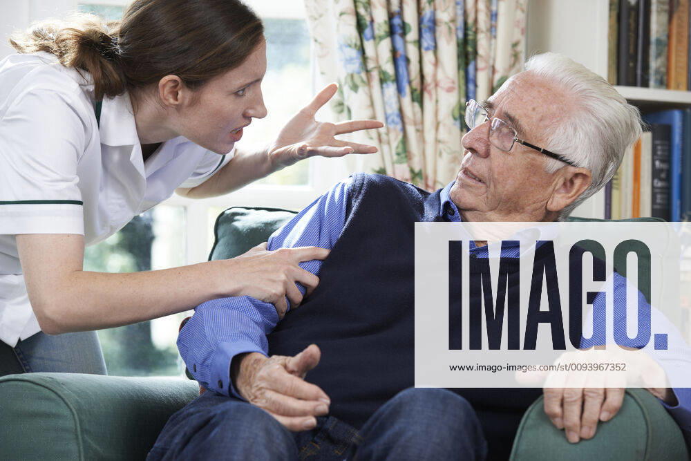 Care Worker Mistreating Senior Man At Home,model released, Symbolfoto,property released ING_39524_02489