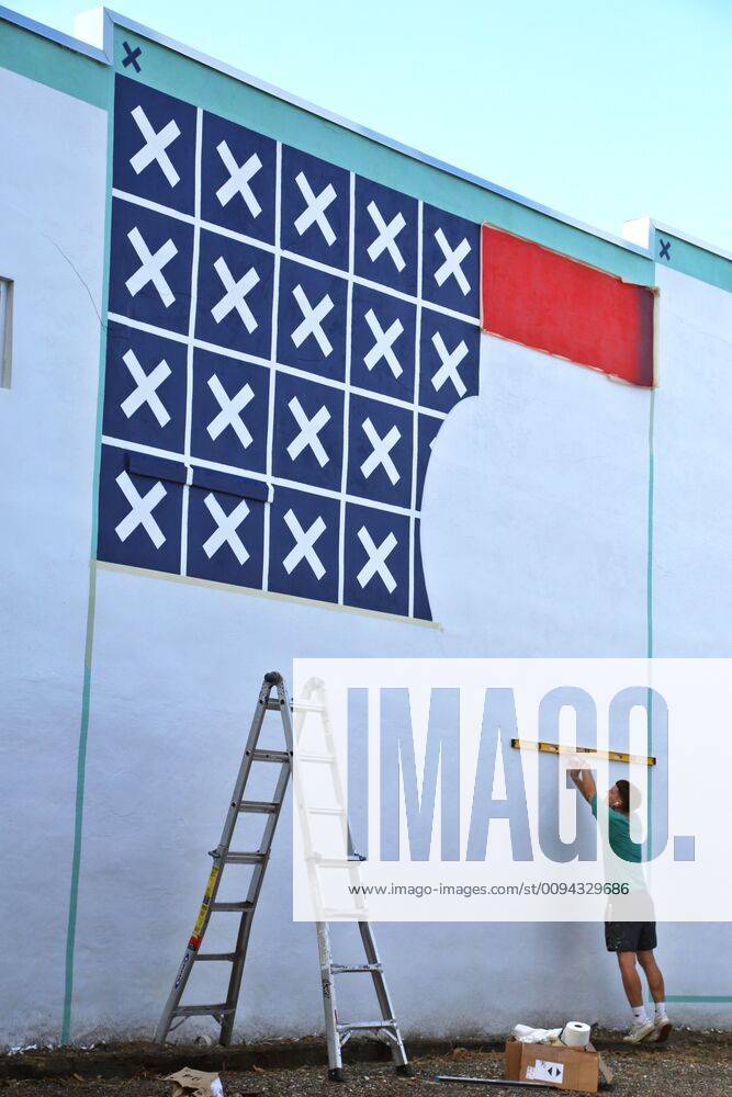 Artist Chris Schmidt, Berlin, Germany, works on a mural at Nova 535, Dr. MLK Jr. St., St. Petersburg, Tuesday, October 22, 2019. The mural represents the World s community on the Internet with seven various web browsers according to Schmidt. Artists are currently participating in the annual Shine Mural Festival through October 26 in St. Petersburg. Five international, four national, and 25 local artists are participating. The festival is produced by the St. Petersburg Arts Alliance. For the full roster of work, go to shinemuralfest.com St. Petersburg USA - ZUMAs70_ 20191022_zan_s70_010